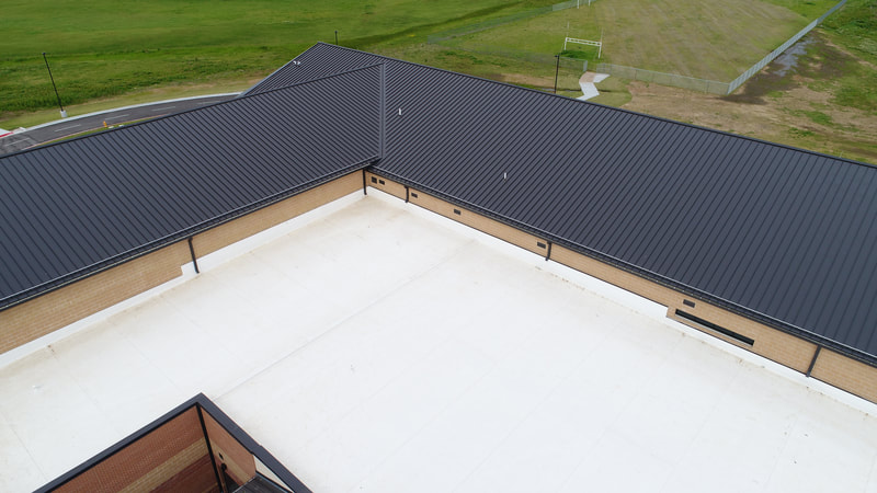 Bixby Public Schools 7th Grade Addition — commercial roofing project by American Roofing