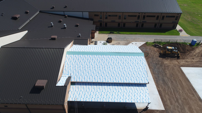 Bixby Public Schools 7th Grade Addition — commercial roofing project by American Roofing