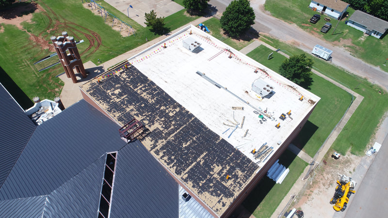 Mulhall Public Schools — commercial roofing project by American Roofing