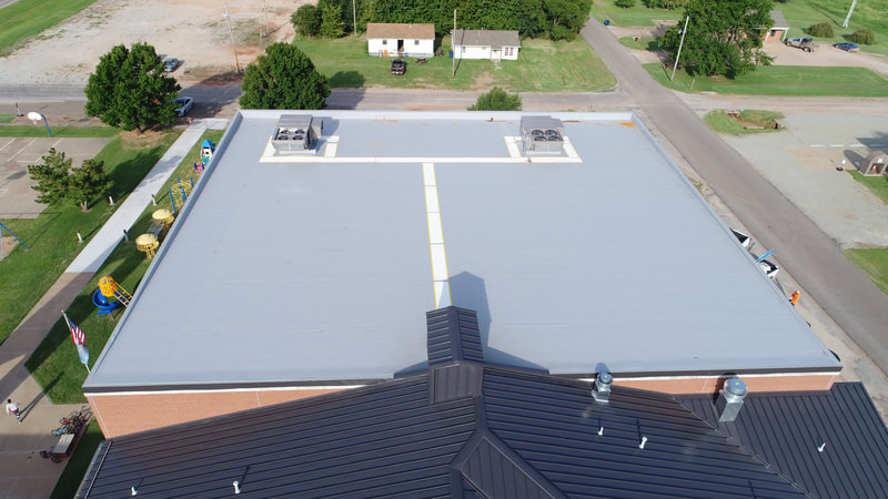 Mulhall Public Schools — commercial roofing project by American Roofing