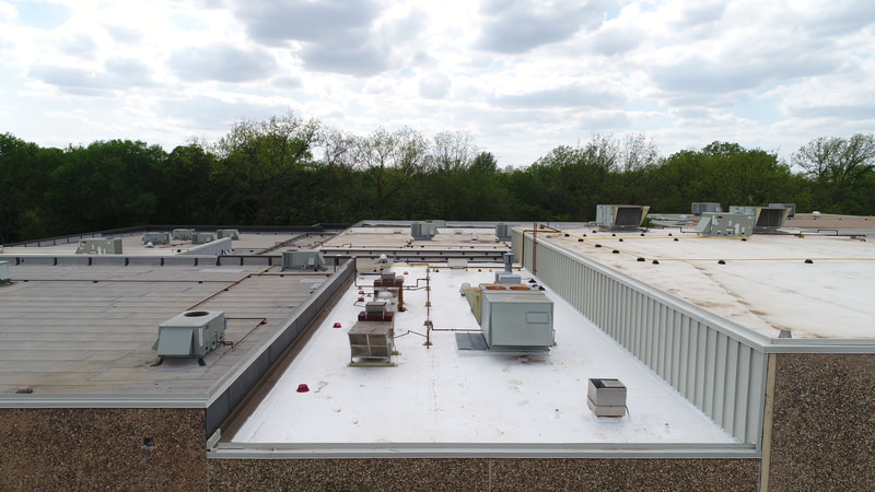 Sangre Ridge Cafeteria — commercial roofing project by American Roofing