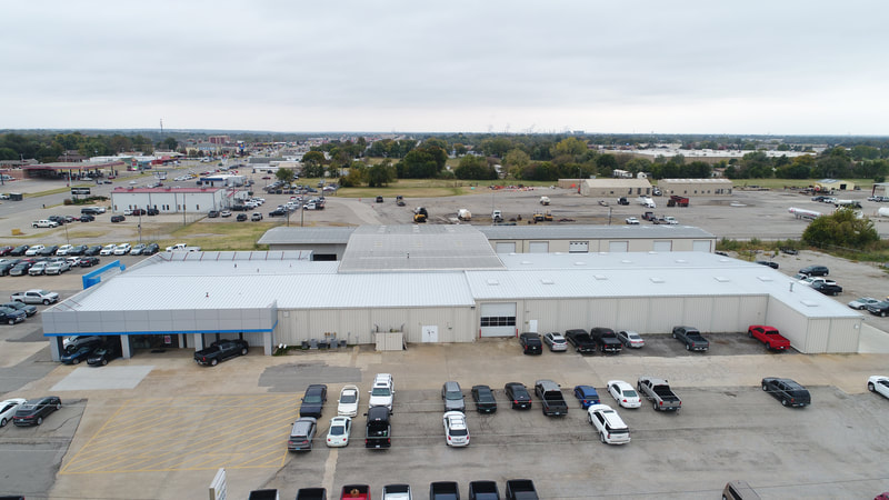 Stuteville Chevy — commercial roofing project by American Roofing