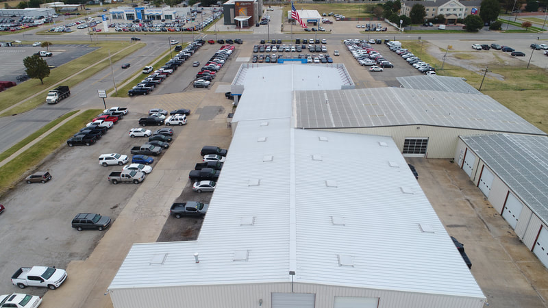 Stuteville Chevy — commercial roofing project by American Roofing